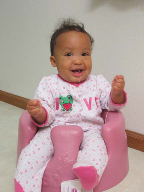 Irene flossing her teeth at 9 months, Fort Collins, Colorado, 2014