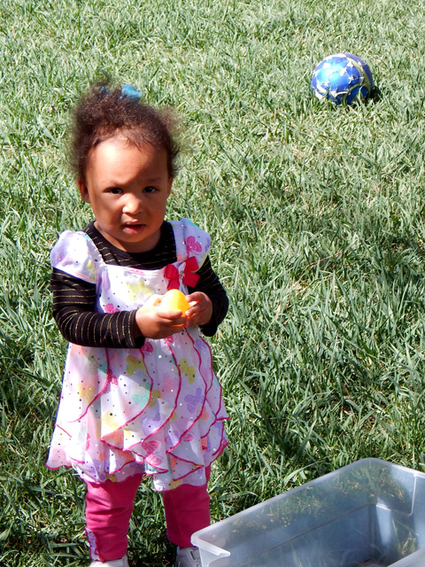 Irene with an Easter egg, Fort Collins, Colorado, 2015