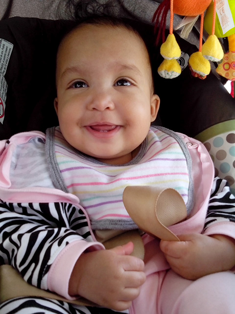 Irene in her car seat at 7 months, Fort Collins, Colorado, 2014