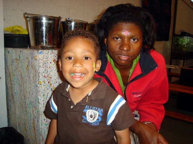 Joachim and Joanitha with face paint, children's museum, Santa Fe, New Mexico, 2009
