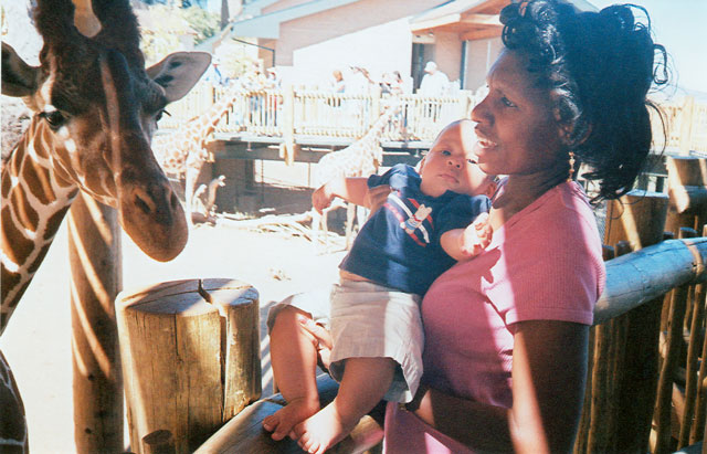 Joanitha, Joachim and giraffe, Fort Collins, Colorado, 2005