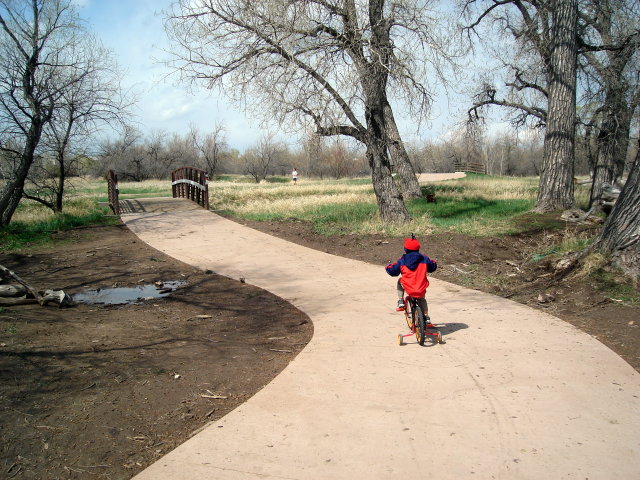 Joachim on his bike by a bridge, Spring Canyon park, Fort Collins, Colorado, 2009