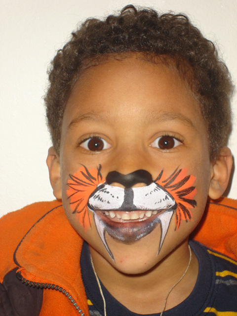 Joachim with tiger face paint, Fort Collins, Colorado, 2011
