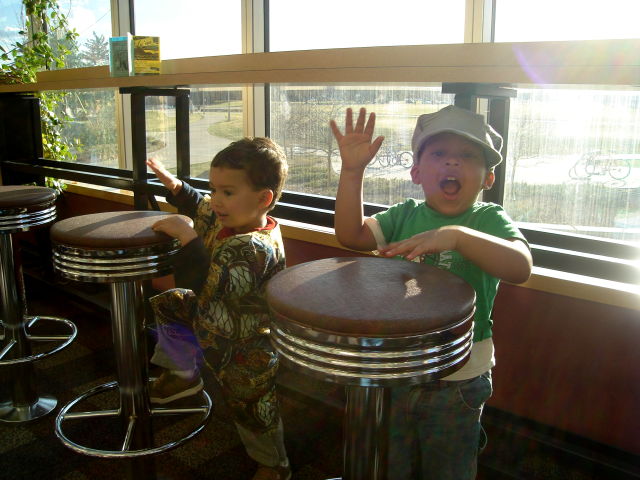 Tariq and Joachim playing 'drums' in the CSU student center, Fort Collins, Colorado, 2008