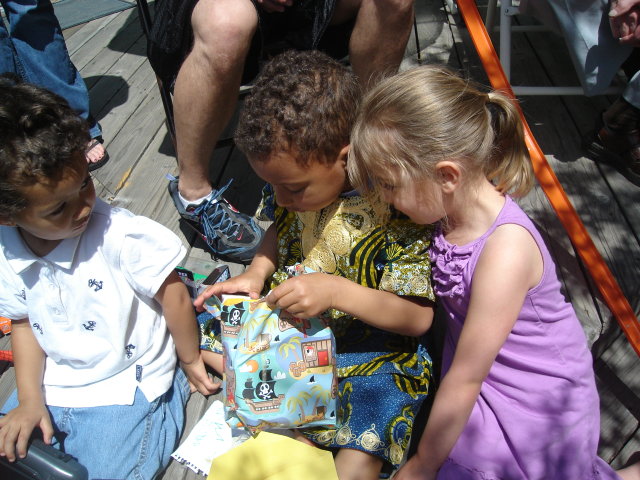 Tariq, Joachim and Maddy with birthday presents, Fort Collins, Colorado, 2009