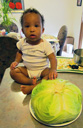 Irene with a cabbage at 11.5 months, Fort Collins, Colorado, 2014