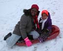 Joanitha and Irene on sled, Fort Collins, Colorado, 2018