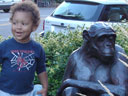 Joachim with chimp statue, Loveland, Colorado, 2007