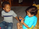 Joachim and Tariq with toys, Fort Collins, Colorado, 2009