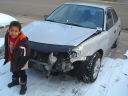 Joachim with totalled Toyota, Fort Collins, Colorado, 2010