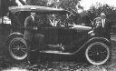 Michael Vogl with old car, Milwaukee, Wisconsin, 1930?